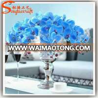 Elegant vases of artificial butterfly orchid flower for decor home